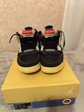 Jordan union 4 noir men’s size 8.5 black and cream with a hint of red and blue